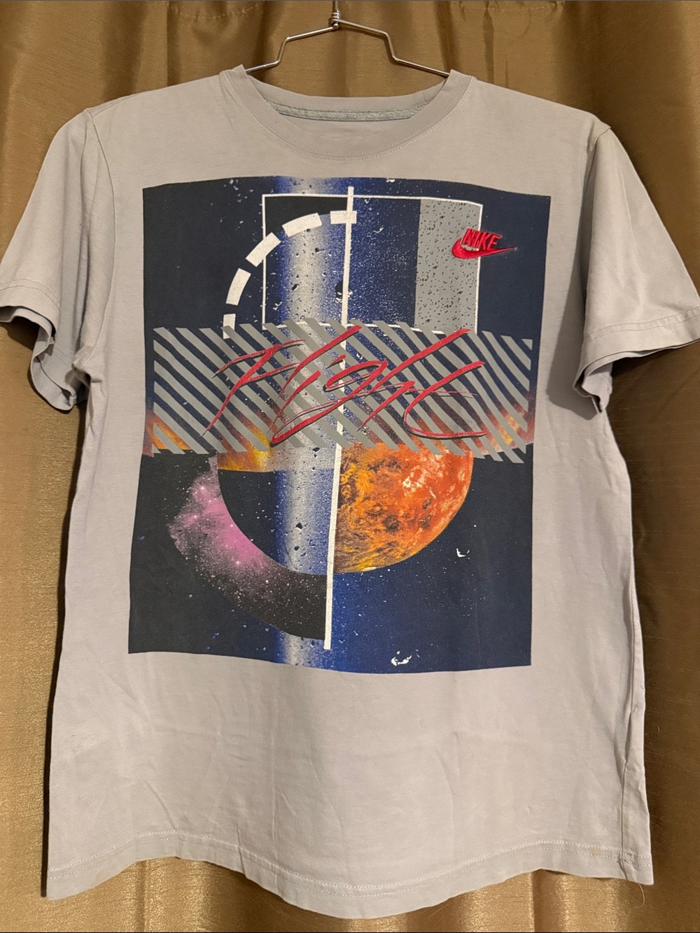 Nike Air Flight space-themed graphic t-shirt.